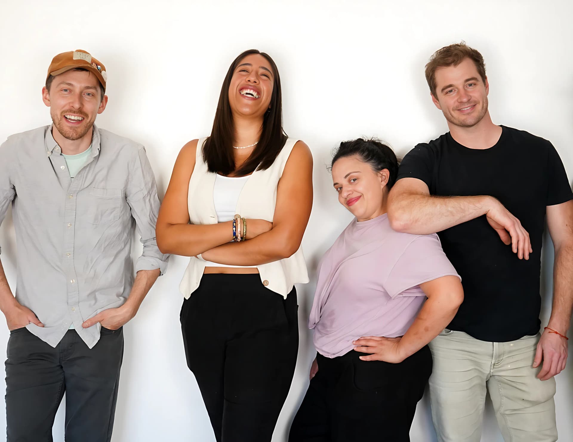 The Culiene team, four people standing together against a white wall